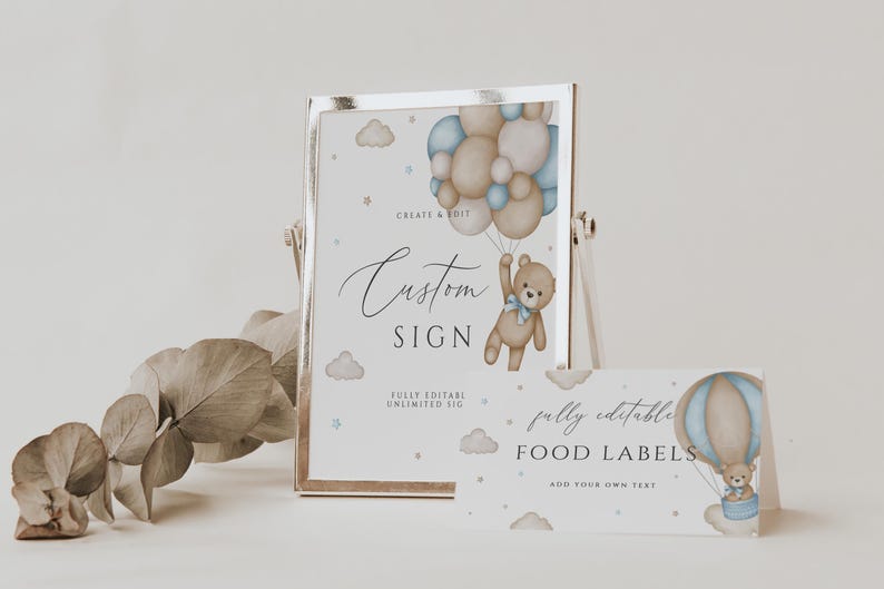May include: A printable sign featuring a teddy bear holding balloons in blue and brown. The sign reads "Custom Sign" and "Fully Editable Unlimited Size". A smaller sign reads "Fully Editable Food Labels Add Your Own Text".