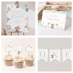 May include: Woodland animal themed first birthday party decorations.  The set includes a welcome sign, food labels, cupcake toppers, and a banner that says "ONE".