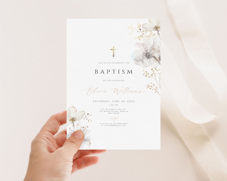 May include: A white baptism invitation with a gold cross and floral design. The text reads "Join us to celebrate the Baptism of our daughter Olivia Williams, Saturday, June 24, 2023, 1:00 PM, St. Michael's Church, 123 White Street, Seattle, WA 12548, RSVP to Alison at 123-456-7890 or alison@email.com".