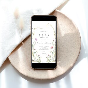May include: A digital invitation for a baby shower with a floral design. The invitation reads "Join us for a Baby Shower honoring Brianna Williams August 14, 2021 at 2:00 PM The Rolling Barn Lexington, Kentucky RSVP by July 15th"