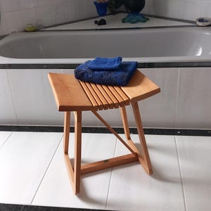 BATHROOM STOOL wonderfully curved, elegant in design, made of solid beech hardwood, finely sanded and treated several times with linseed oil, unique.