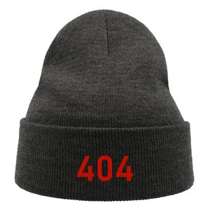 Peut inclure: Ensemble de trois tasses en céramique avec une finition mate et mouchetée. Les tasses sont de couleur crème, gris clair et gris foncé. Chaque tasse a un design simple et minimaliste et une anse arrondie.