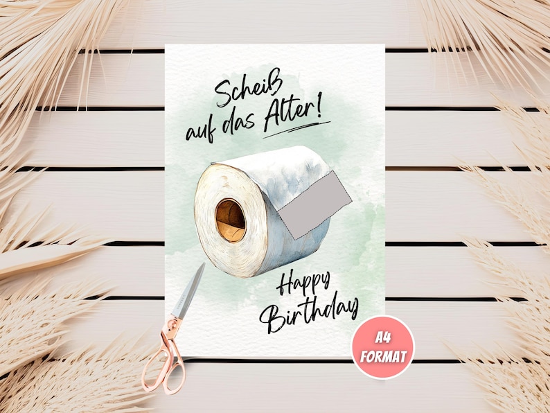May include: A birthday card with a watercolor illustration of a toilet paper roll with the text "Schei&szlig; auf das Alter! Happy Birthday" and the words "A4 FORMAT" in a pink box.