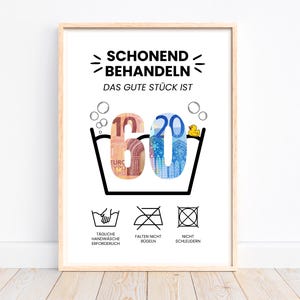 May include: A white poster with black text that reads "Schonend Behandeln Das Gute Stück Ist 60" with a picture of a 60 euro bill in a washing machine with a yellow rubber ducky on top. The poster also has three washing instructions symbols: hand wash, do not iron, and do not tumble dry.