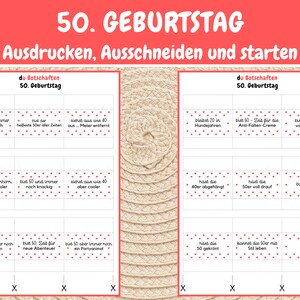 May include: A printable set of 12 cards with red hearts and text in black. The cards feature humorous messages about turning 50. The text on the cards includes phrases like "bist 50, aber immer noch kindisch" and "bist 50 - Zeit f&uuml;r die Anti-Falten-Creme".