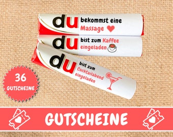 May include: A set of three red and white gift vouchers with the text "du" and different messages. The messages are "bekommst eine Massage", "bist zum Kaffee eingeladen", and "bist zum Cocktailabend eingeladen". The vouchers are on a brown burlap background.