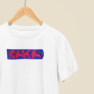 Bukayo Saka Nando&#39;s Peri Peri Sauce Arsenal Little Chilli Graphic Tee Shirt