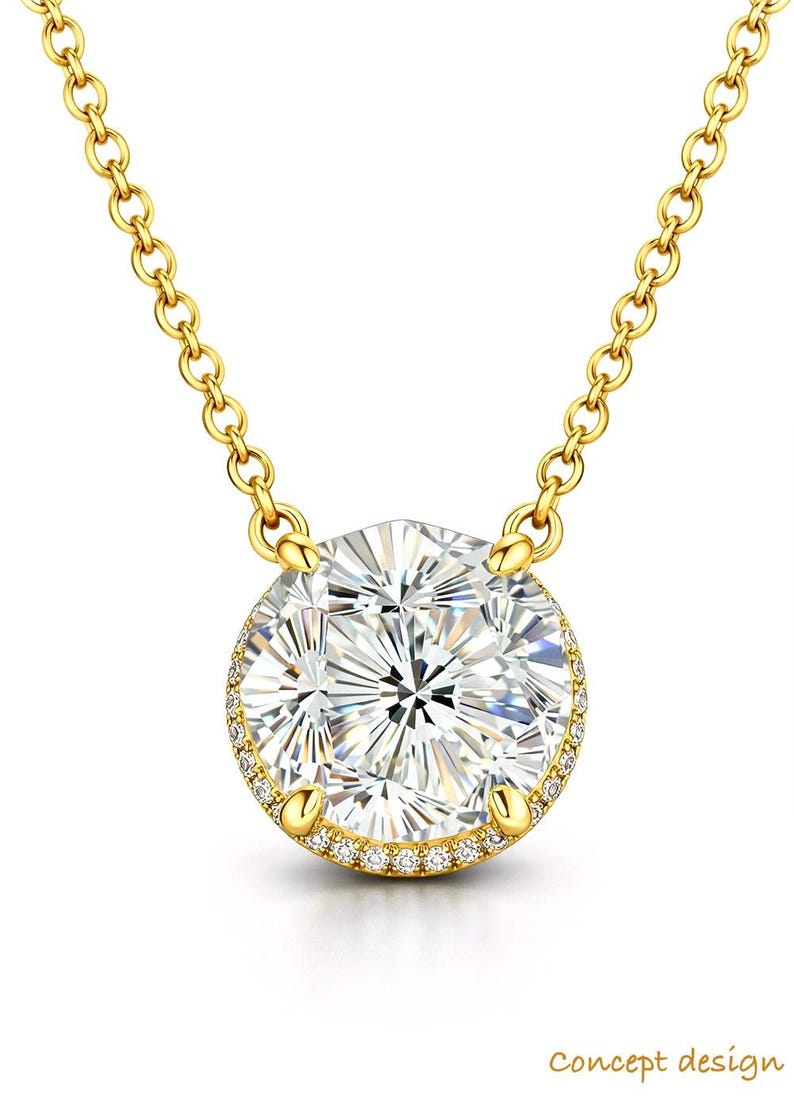 May include: A gold necklace featuring a large, round, clear gemstone pendant. The pendant is surrounded by smaller, clear gemstones and set in a gold bezel. The chain is also gold and has a delicate link design.