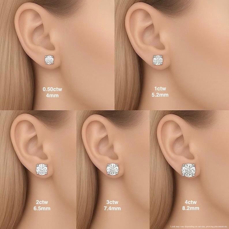 May include: A set of five round, clear stud earrings in silver-toned settings, displayed on ears to show size variations from 0.50ctw at 4mm, 1ctw at 5.2mm, 2ctw at 6.5mm, 3ctw at 7.4mm, to 4ctw at 8.2mm, providing a clear visual scale comparison.