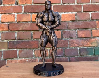 Kevin Levrone Bodybuilding Statue – Hands-Clasped Most Muscular Pose – Collectible Figure – Mr. Olympia Inspired Gym Decor