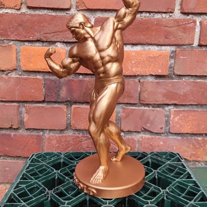 Arnold Schwarzenegger Statue ,,Arnold Classic avec support Hauteur 20/37/55 cm Séance photo bronze Dark Gold