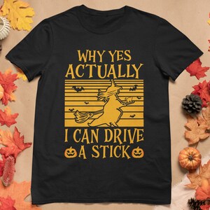Funny Halloween T-Shirt with Witch on Broomstick and &quot;Why Actually Yes, I Can Drive a Stick&quot; Saying