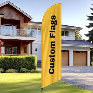 May include: A yellow feather flag with the text "Custom Flags" in black. The flag is displayed outdoors in front of a house with a well-manicured lawn. The flag is attached to a black pole.
