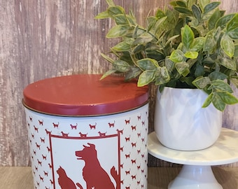 Vintage Friskies dog and cat food tin.