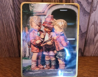 MJ Hummel vintage tin.  3 boys