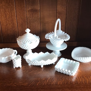 Fenton hob nail milk glass pieces.  Sold separately.