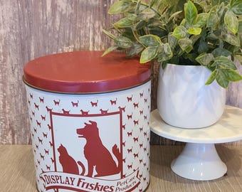 Vintage Friskies dog and cat food tin.