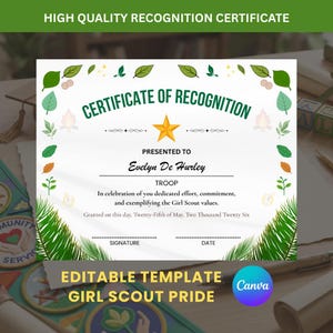 May include: A certificate of recognition with the text "Certificate of Recognition" and "Presented to Evelyn De Hurley". The certificate has a gold star and green leaf and fern accents. The text "Girl Scout Pride" is at the bottom.