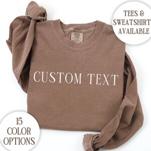 This Comfort Colors tshirt, long sleeve tee, or sweatshirt can be personalized with the custom text of your choice to make an extra special gift for a woman. It is trendy, minimalist and cute. Perfect for Mother's day, weddings, brides and birthdays.