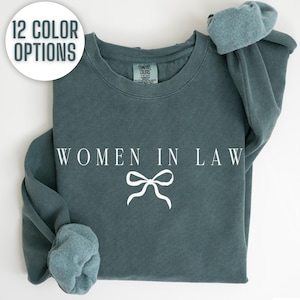 This "Women in Law" shirt celebrates empowering women in the legal profession. Perfect for female lawyers, law students, and professionals, this shirt promotes legal equality and feminism and is comfy. Perfect gift for women in law.