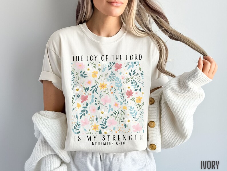 The popular Comfort Colors ivory colored t shirt is so beautiful as a background for this elegant flower graphic. This would make an awesome gift for religious ladies who have faith in Jesus Christ.