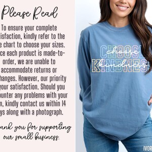 May include: A light blue long-sleeved t-shirt with the text "Choose Kindness" in rainbow colors. The shirt is made of a soft, comfortable material and is perfect for everyday wear.
