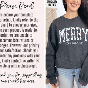 May include: Dark grey heather sweatshirt with a white graphic that says "Merry Christmas" with a pattern of small Christmas trees in red, green, and white.