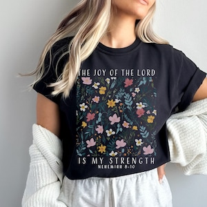 The black comfort colors tee is cute and the font is white to contrast against the black tee.
