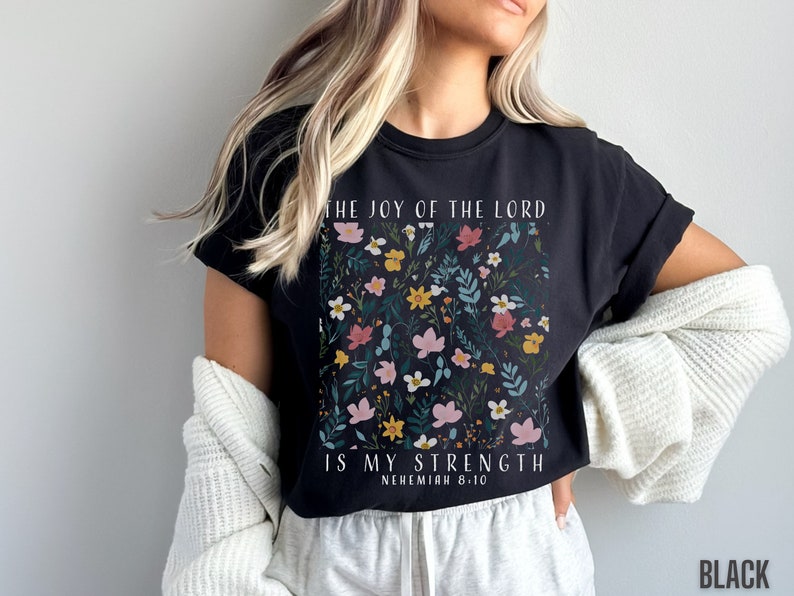 The black comfort colors tee is cute and the font is white to contrast against the black tee.