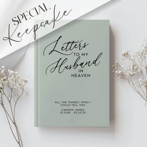 May include: A light green journal with the text "Letters to my Husband in Heaven" and "All the things I wish I could tell you" in black text. The journal also includes the text "Carson Jones 12.13.85 - 02.25.25".