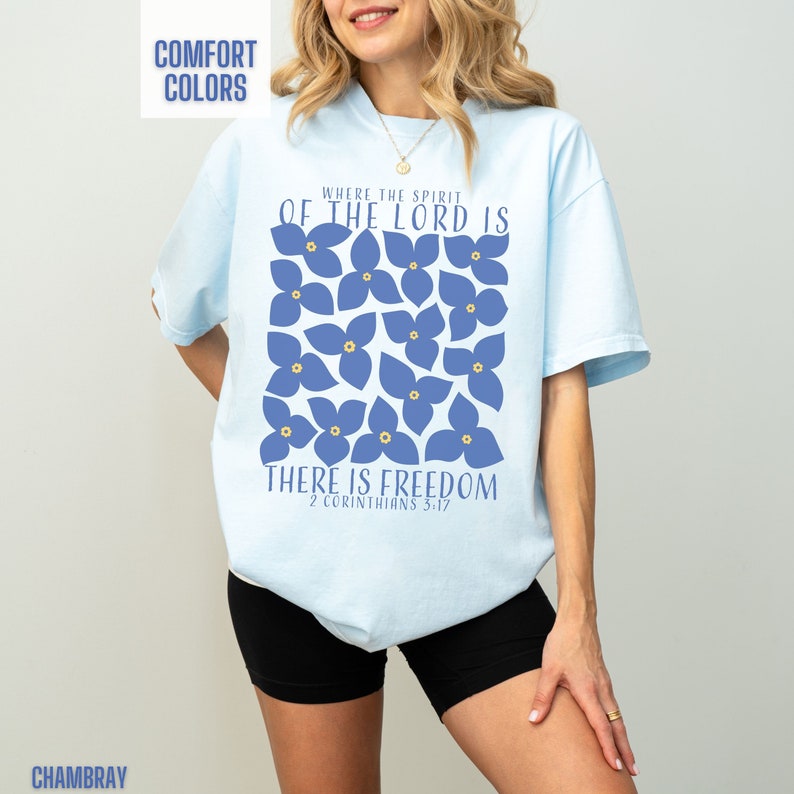 This boho Christian graphic tee for women comes in bright and colorful Comfort Colors brand shirts. The blue flower design is so cute with a Bible verse to go along with it.  This makes a wonderful Christian Women gift or an adult baptism gift.