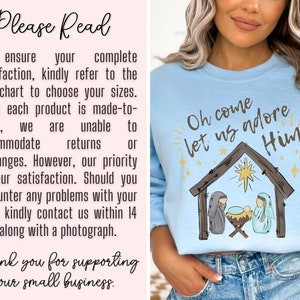 Puede incluir: Sudadera azul claro con un gr&aacute;fico de la natividad de Navidad y el texto "Oh come let us adore Him".