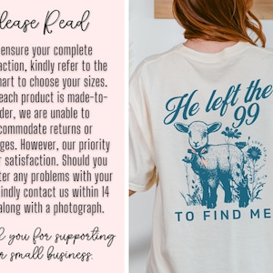May include: Cream-coloured t-shirt with a teal graphic of a lamb and the text "He left the 99 to find me." The shirt also has the text "Luke 15:4-7". The front of the shirt has the text "Please Read" and other text.