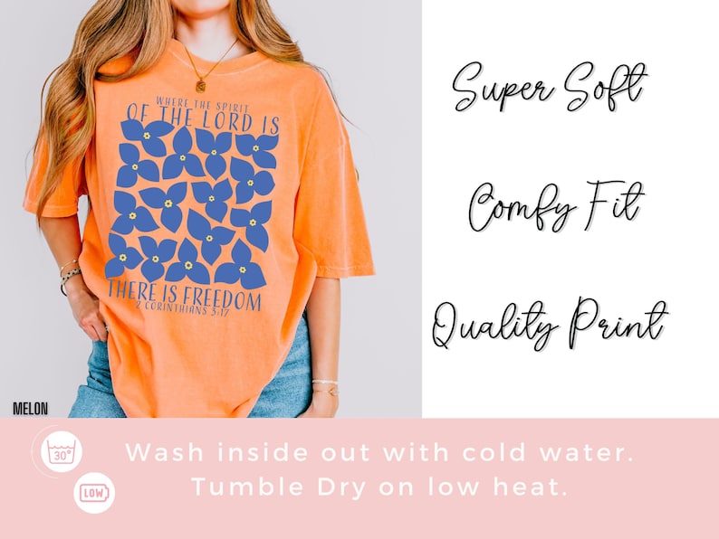 May include: Orange t-shirt with a blue floral design and the text "Where the spirit of the Lord is there is freedom 2 Corinthians 5:17".