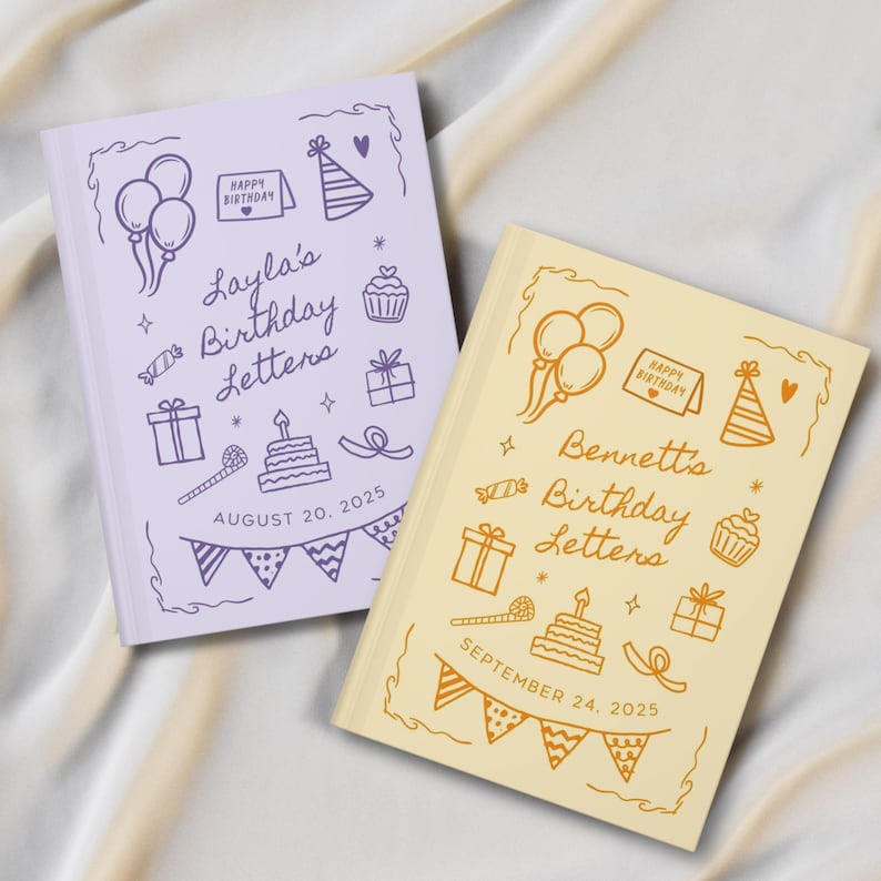 May include: Two birthday memory books. One is lavender with purple illustrations and the text "Layla's Birthday Letters, August 20, 2025." The other is cream with orange illustrations and the text "Bennett's Birthday Letters, September 24, 2025."