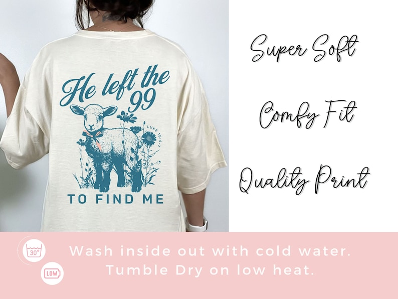May include: A cream-coloured t-shirt featuring a teal graphic of a lamb and flowers, with the text "He left the 99 to find me." The shirt also has the words "Super Soft," "Comfy Fit," and "Quality Print."