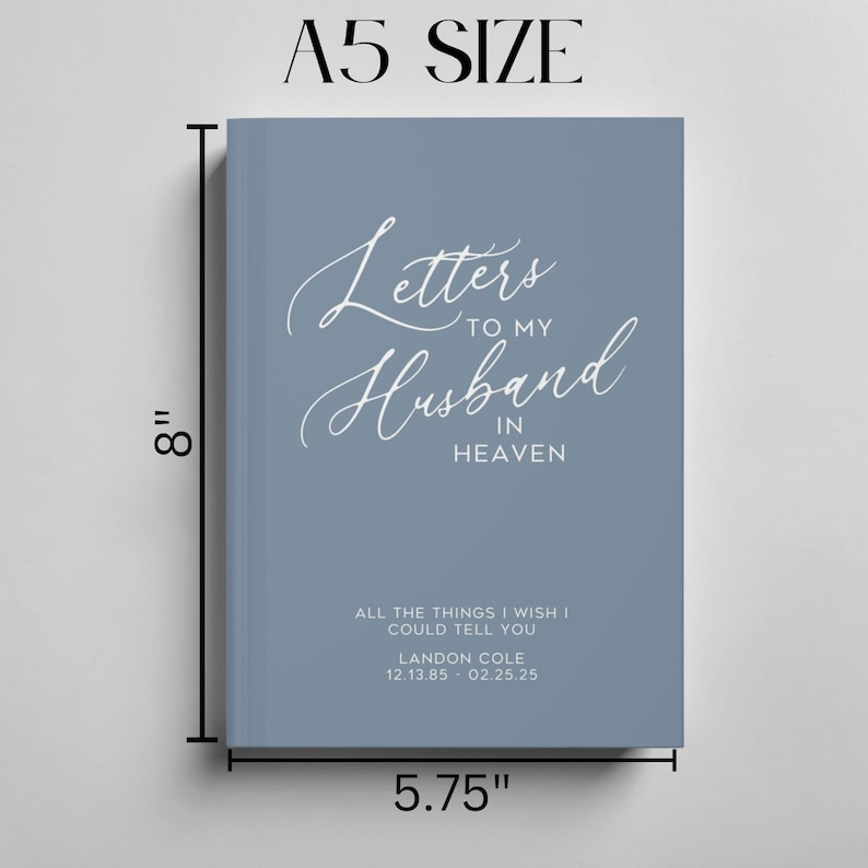 May include: A blue journal with the text "Letters to my Husband in Heaven" and the text "All the things I wish I could tell you" with a name and dates below. The journal is 8 inches tall and 5.75 inches wide.