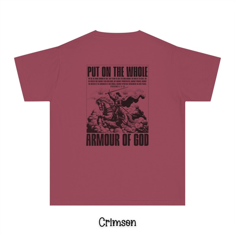 May include: Crimson red t-shirt with a black graphic print of a knight in armor riding a horse. The graphic includes the text "Put on the whole armour of God" and a bible verse reference.