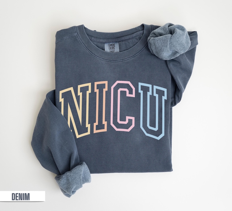 This Comfort Colors NICU Sweatshirt or Tshirt is the perfect gift for a NICU nurse, neonatologist, nurse practitioner or anyone in the NICU department.  Give as a nurse appreciation gift for a thoughtful gift.  The colorful design simply says NICU.