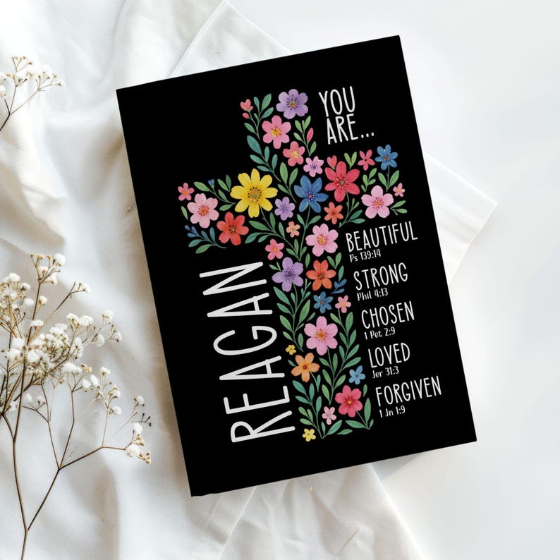 Personalized Christian journal for women and girls with a floral cross design on the cover. The front features “You Are” affirmations with Bible verses and a custom name option. Available in 8 colors, this faith-based notebook can be used for prayer journaling, Bible study notes, gratitude, reflections, and daily writing. Optional customization available for spine and back cover text. Feminine, inspirational gift idea for teens, women, church, or special occasions.
