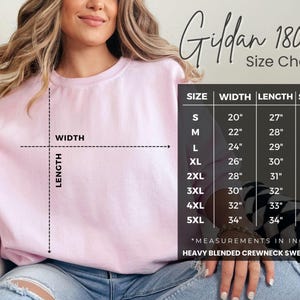 May include: A light pink crewneck sweatshirt with a size chart. The chart displays measurements in inches for width, length, and sleeve length, ranging from size small to 5XL. The sweatshirt is a heavy blended crewneck.