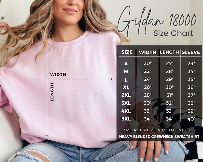 May include: A light pink crewneck sweatshirt with a size chart. The chart displays measurements in inches for width, length, and sleeve length, ranging from size small to 5XL. The sweatshirt is a heavy blended crewneck.