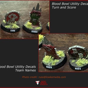 May include: Miniature game markers for Blood Bowl featuring round and upright designs with red, green, and metallic silver paint. The bases are black with green flocking and white text labels reading Turn, Score, and Orcs. The text Blood Bowl Utility Decals Turn and Score and Blood Bowl Utility Decals Team Names is visible.