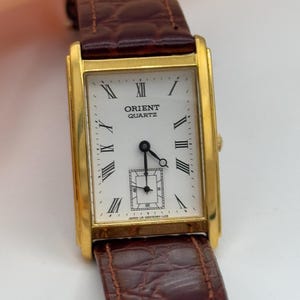 1990s Orient Art Deco Tank  Sub Second Roman Dial