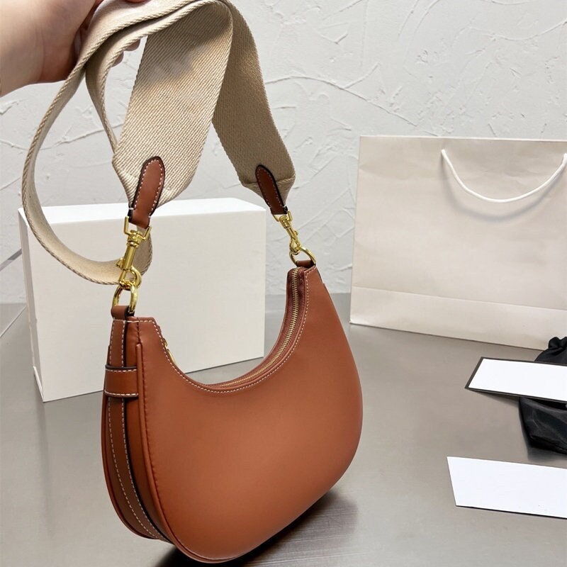 Celine bags. Small bag Bucket, BOSTON, AVA, in Triomphe Canvas and calfskin.  