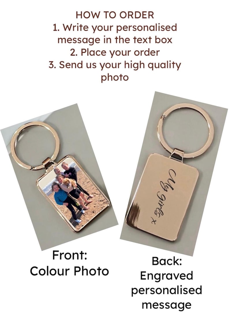 May include: A gold-colored metal keychain with a rectangular photo insert on the front and an engraved message on the back. The photo insert shows a group of people on a beach. The engraved message says "My girls x".