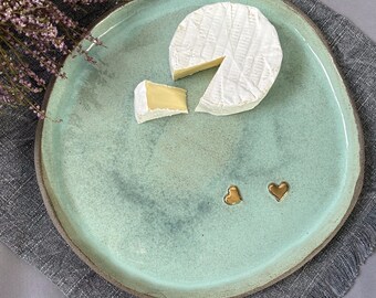 Stoneware ceramic green plate with gold hearts, handmade