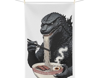 ラーメンを食べるゴジラのティータオル｜おもしろいモンスターキッチンデコレーション