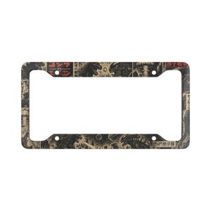 May include: A rectangular license plate frame featuring a detailed graphic print of Godzilla and an Alien creature in a comic book style. The design includes black, beige, and red tones with Japanese text characters and illustrations of explosions.