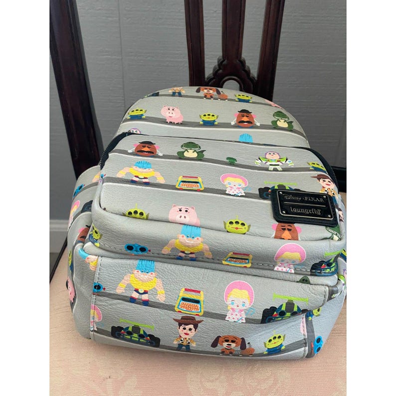 Loungefly Disney Pixar Toy Story Woody & Buzz Clouds Mini Backpack Andy Room image 8
